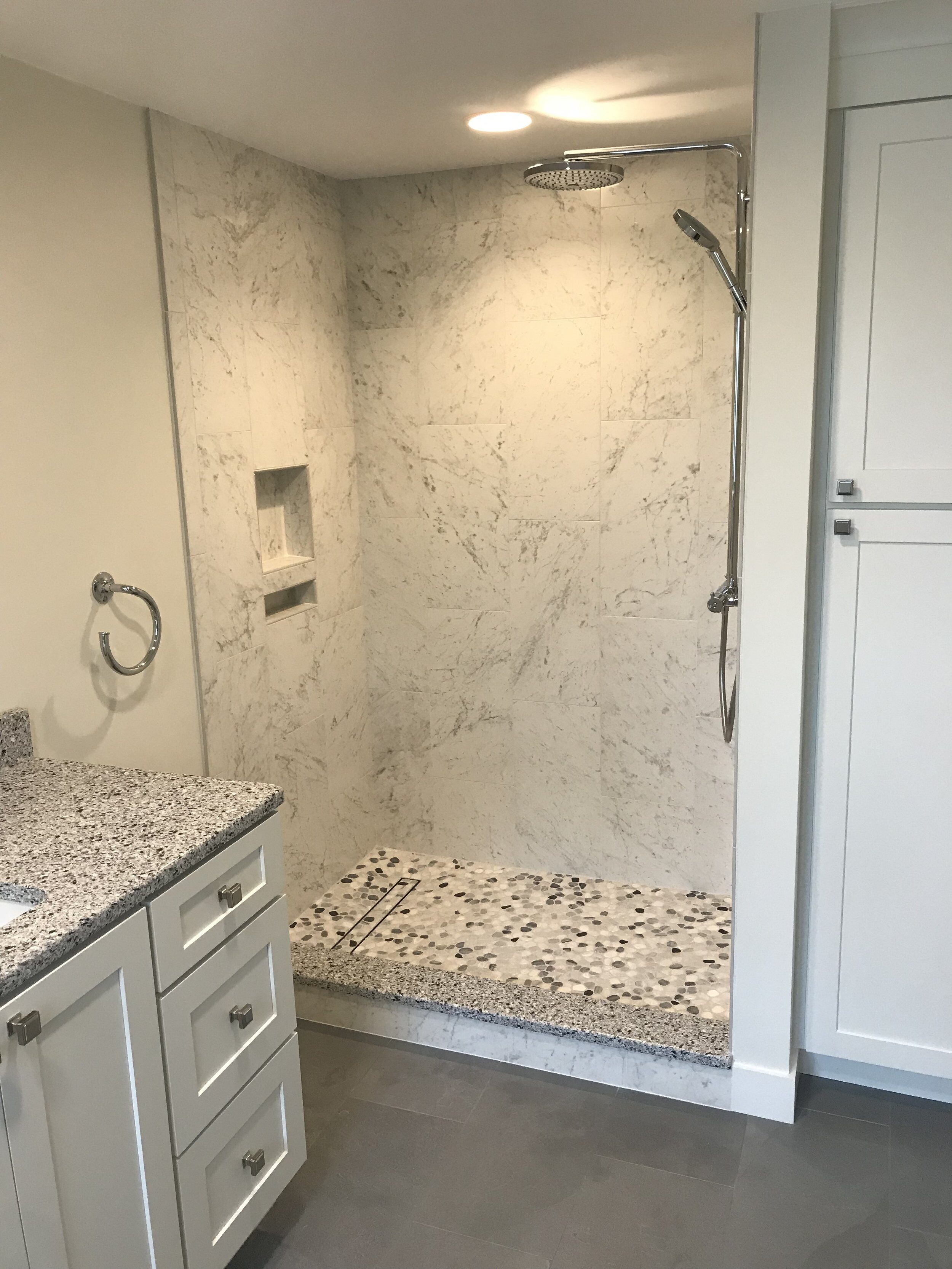 Custom trench drain in remodeled shower.