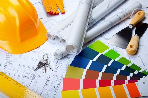 Architect's tools, blueprints, hardhat, color swatches