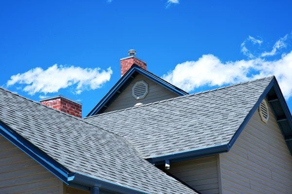 Roof of home with blue sky