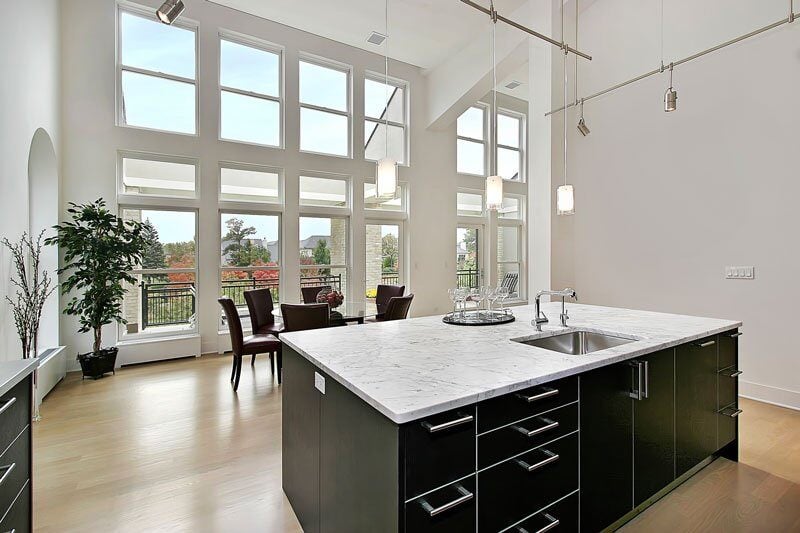 Elegant minimalist living space with high ceilings