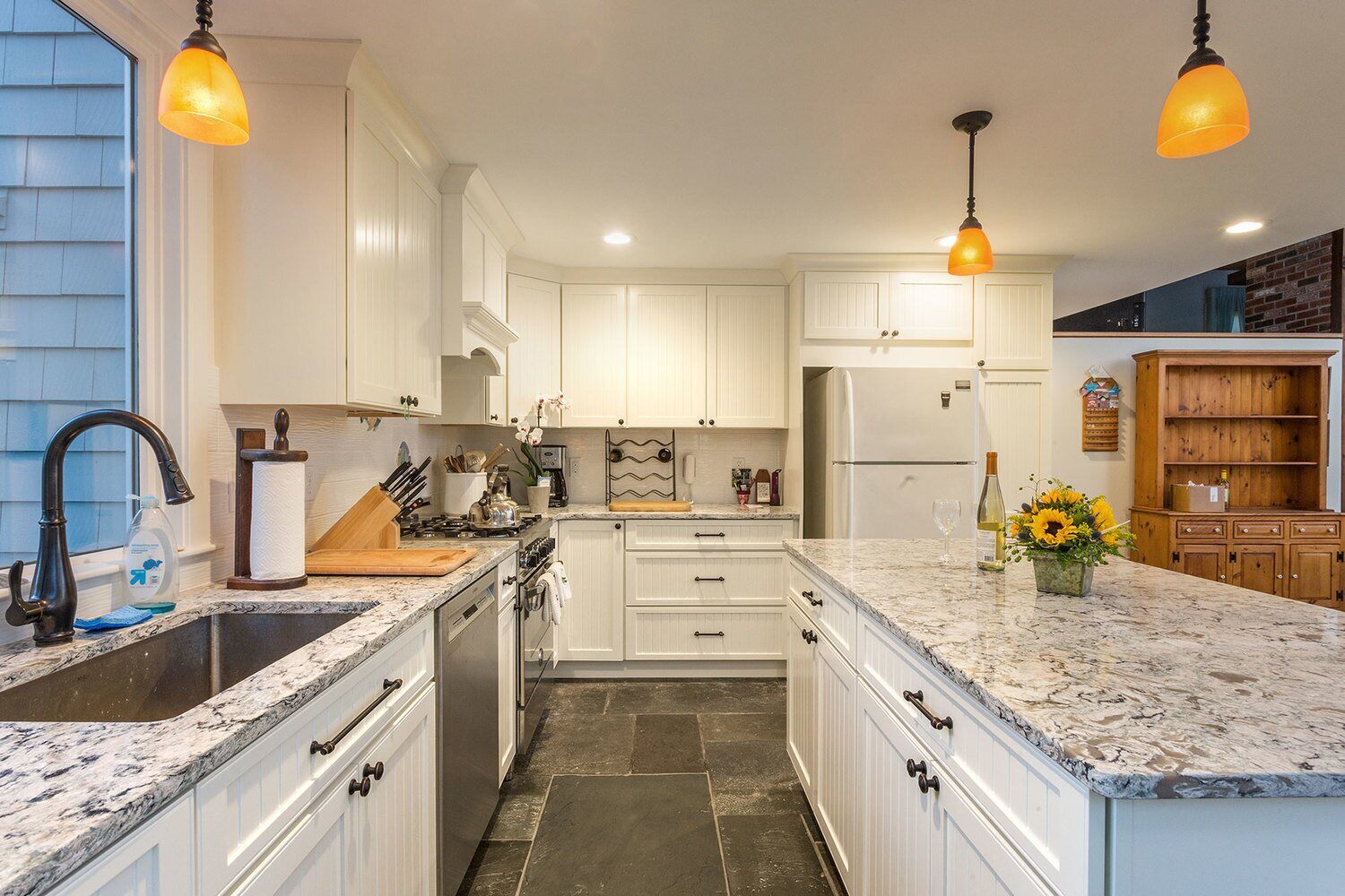 Newly remodeled kitchen with large island and modern appliances in North Falmouth